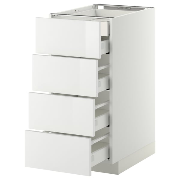 This image shows a white, modern, multi-drawer cabinet with sleek, high-gloss surfaces and clean lines.
