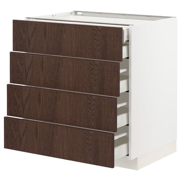 Dark brown wooden drawer unit with four drawers and white interior. Part of the METOD kitchen system.