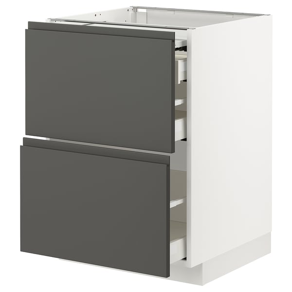 A modern, white kitchen cabinet with two dark grey drawers, integrated handles, and smooth glide mechanisms, part of the METOD kitchen system.