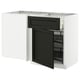 Modern white kitchen unit with dark stained drawer and pull-out shelves.