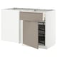 This image shows an open METOD kitchen unit with beige fronts, featuring a pull-out shelf for storage.