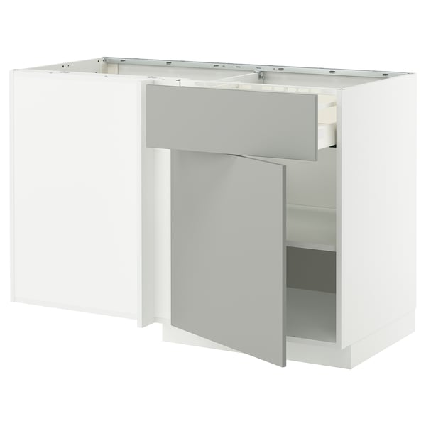 Modern white l-shaped kitchen unit, clean, minimalist design.