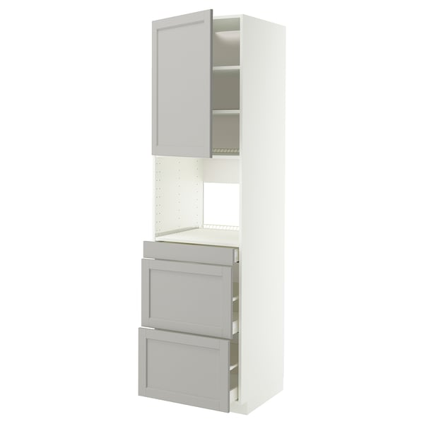 A white and light grey METOD kitchen unit with drawers and shelves. It a classic design with bevelled edges and a sturdy construction.