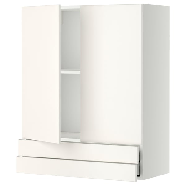 A white METOD kitchen cabinet with one open door. It a modern, sleek design with smooth lines and a spacious appearance.