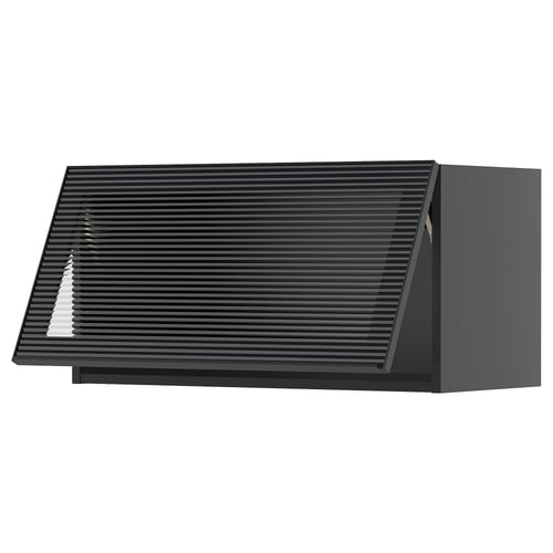 Modern black kitchen cabinet with sleek glass door and vertical reeded design.