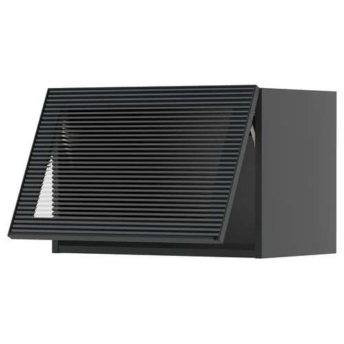 Modern black kitchen wall cabinet with sleek, slanted glass door featuring vertical reeded texture.