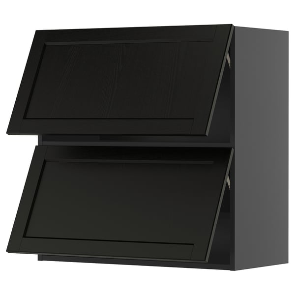Black kitchen cabinets, two square doors with beveled edges.