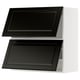 Black, modern kitchen cabinet set with bevelled edges.