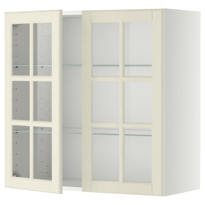 Ikea METOD kitchen cabinet with off-white bodbyn glass doors, featuring beveled edges and adjustable glass shelves.