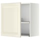 Off-white kitchen cabinet with bevelled edges, open door showing metal dish drainer, creamy, rectangular.