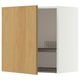 An open METOD wall cabinet with a light wooden door and a built-in dish drainer.