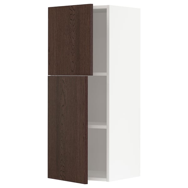 A METOD kitchen cabinet with dark brown sinarp fronts, featuring a wood edge and sturdy frame construction.