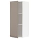 A METOD kitchen cabinet in matte grey-beige with adjustable shelves.