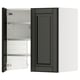 A black METOD kitchen cabinet with adjustable shelves, hinges on the door, and a modern, sleek design.