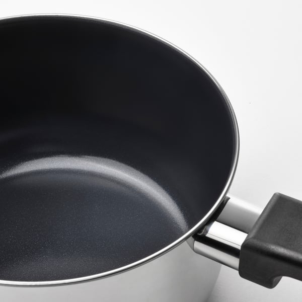 High-quality midgasmat saucepan with black non-stick interior, stainless steel exterior, and large handle.