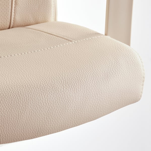 Close-up of beige, upholstered office chair, showcasing smooth fabric and neat stitching.