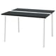 A black MITTZON conference table with white legs, rectangular shape, and smooth surface. Supports cable management.
