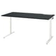 The MITTZON desk a black rectangular top with adjustable white legs, providing a sleek, modern look.