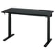 Black MITTZON adjustable desk with steel legs and cable management tray.
