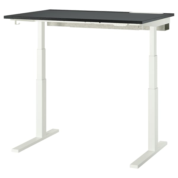 MITTZON black sit-stand desk on white legs.