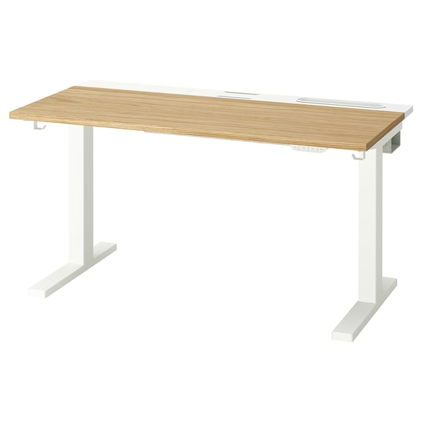 Modern desk with light wood top and white legs, featuring adjustable height and cable management.