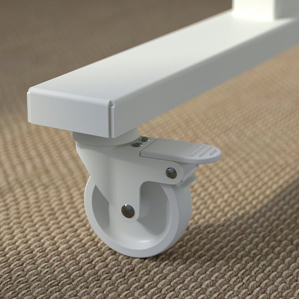 Close-up of a white, portable table leg with a lockable caster, designed for easy mobility and stability.