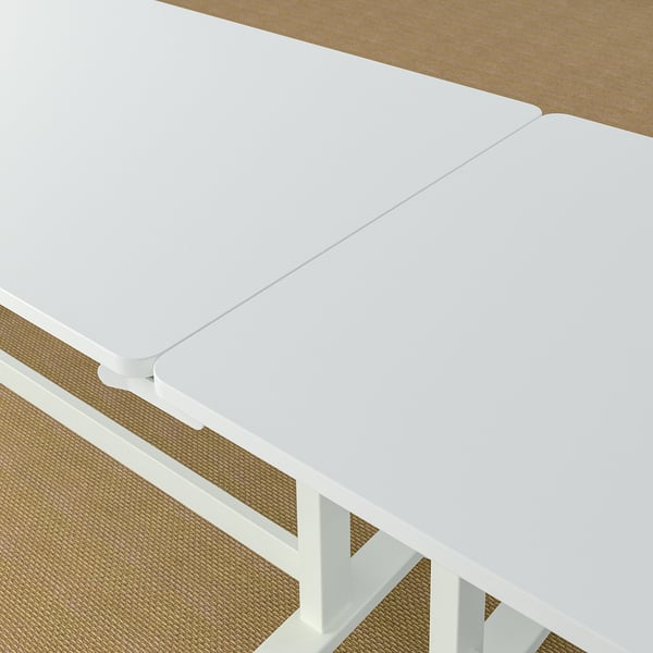 Foldable white conference table on wheels, ideal for meetings. Easily rolls, locks, and folds for storage.