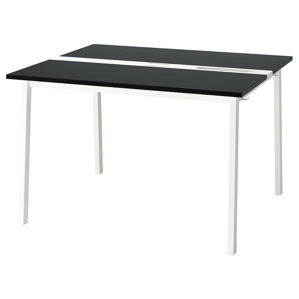 MITTZON table. Black rectangular top, four white metal legs. Stain-resistant surface.