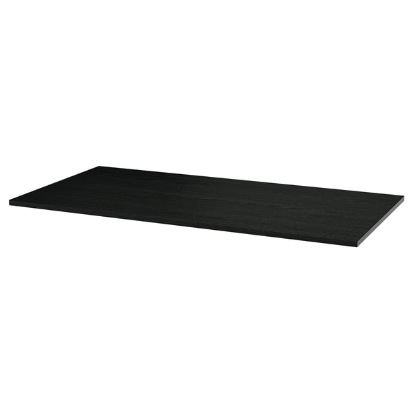 The MITTZON is a black rectangular table top made of durable paper foil, particleboard, ash veneer, and clear acrylic lacquer.