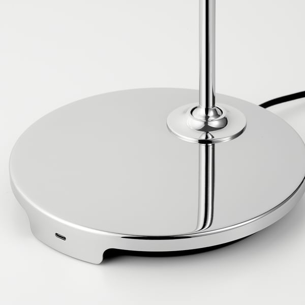 Modern chrome-plated desk lamp with sleek design and adjustable joints, featuring usb-c charging port.