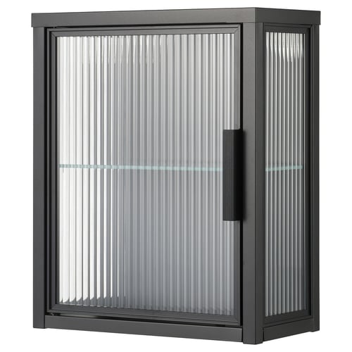 The MOSSJÖN wall cabinet in black with a frosted glass door, featuring a sleek, modern design with a magnetic door closure.