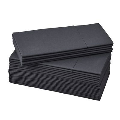 Stack of black, rectangular paper napkins with a pocket, neatly arranged.