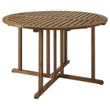 NÄMMARÖ round outdoor table, brown stained acacia wood, sturdy and social shape.
