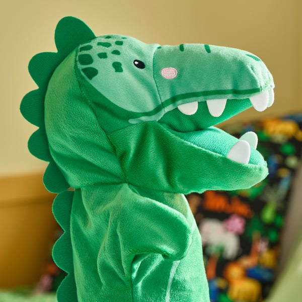 Soft, bright green crocodile puppet with detailed spikes and friendly smile.