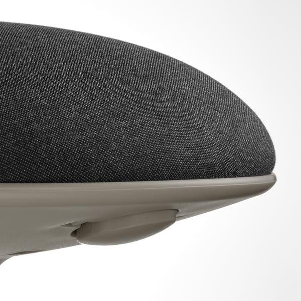 Close-up of a modern upholstered seat cushion, featuring smooth fabric and sleek metal base, highlighting comfort and quality.