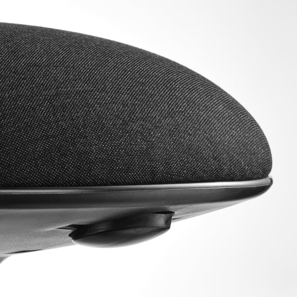Close-up of high-quality office chair seat; soft, textured fabric over firm cushion, affixed securely to sleek, black base.