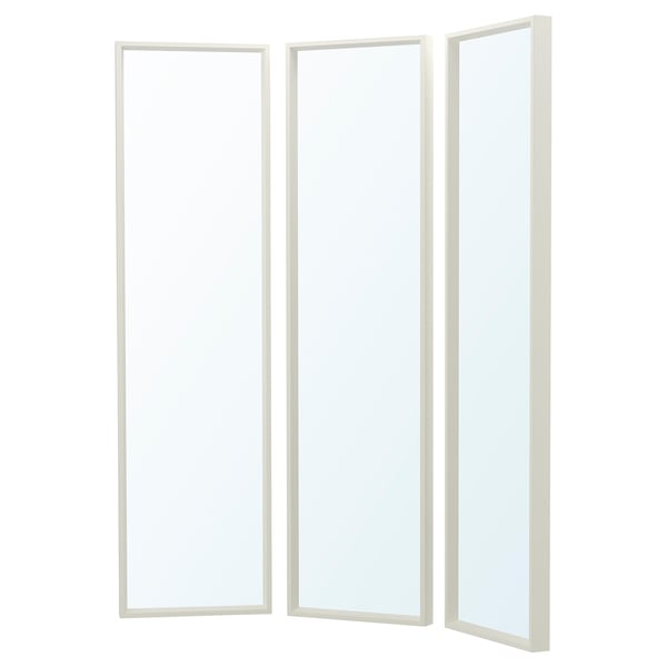 A white NISSEDAL tri-fold mirror with minimalist design, ideal for bathrooms. It has a fiberboard frame and glass mirrors.