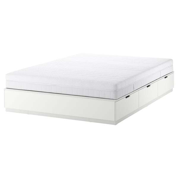 NORDLI white platform bed with 6 drawers and foam mattress.