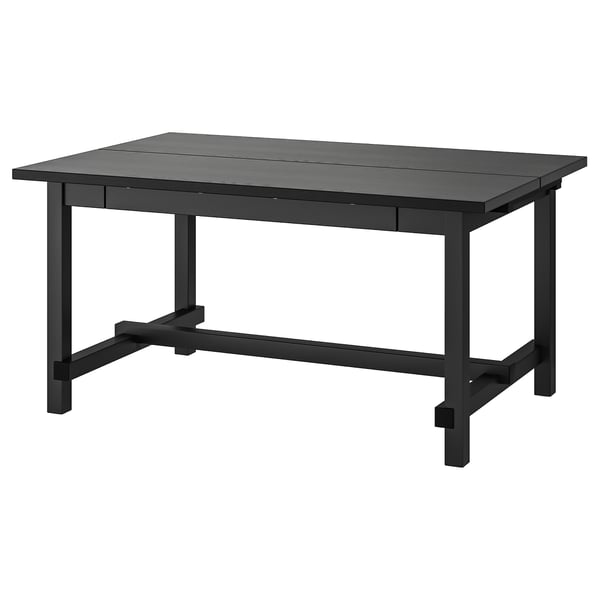 NORDVIKEN: black wood dining table; rectangular, sturdy, with self-storing leaves.