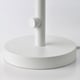 Base of a modern table lamp, sturdy design with a round, smooth finish.