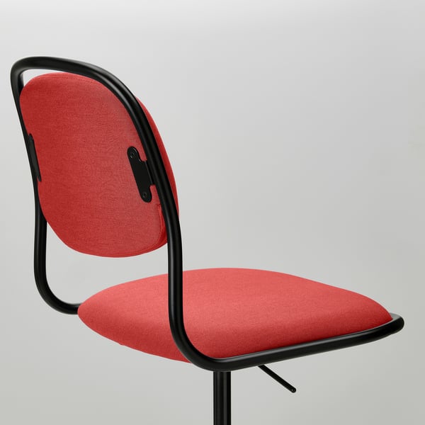 Modern red office chair with black metal frame, padded for comfort.