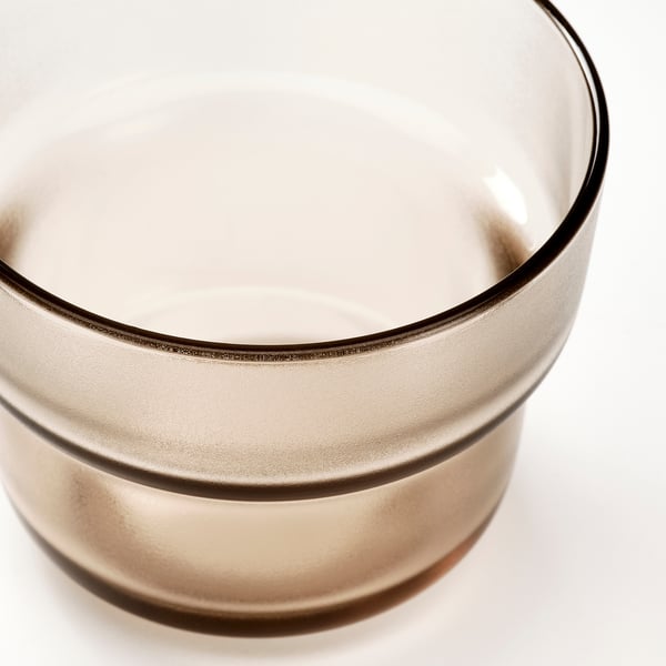 Tempered glass cup with textured, crafted design.