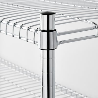 Chrome-finished metal shelf support detail, showing sturdy joints and smooth surface.