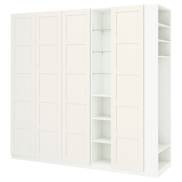 White PAX wardrobe set; closed and open sections on left, fully open shelves on right, sleek and modern design.