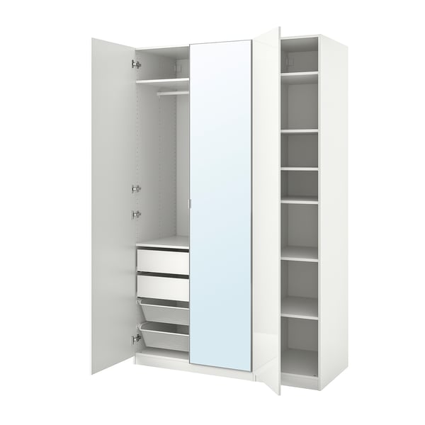 A white PAX wardrobe. It has open doors revealing shelves and drawers.