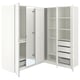 A white PAX corner wardrobe with mirrored doors and internal shelves.
