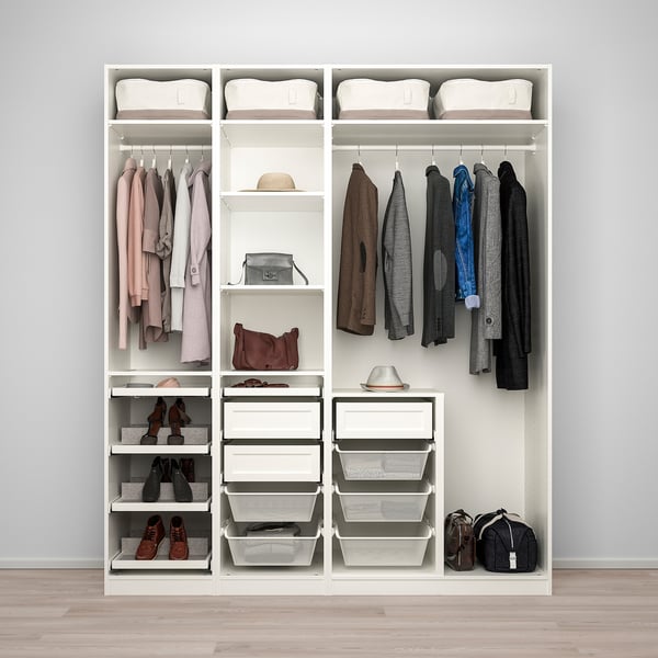 Closet with hanging clothes, shelves, shoe racks, and storage baskets.