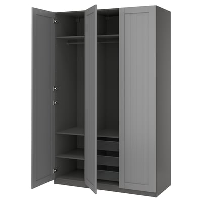 A grey PAX wardrobe with open doors showing storage shelves and organisers.
