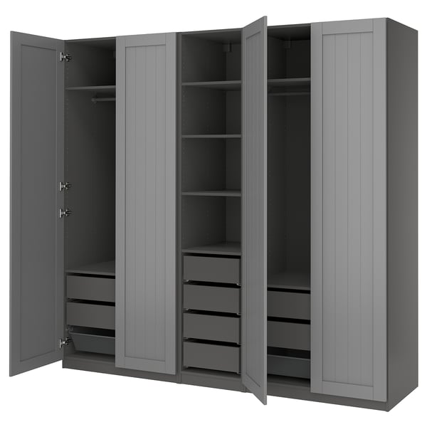 Gray PAX wardrobe with open doors revealing shelves and drawers.