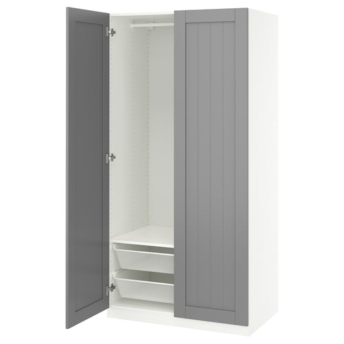 Closed wardrobe with white and gray panels, featuring one open door revealing mesh baskets and shelves inside.